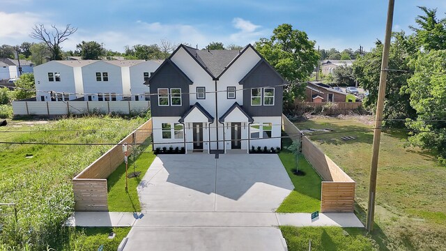 6726 Dumble St, Houston, TX 77021 - view of front facade with concrete driveway and a residential view
