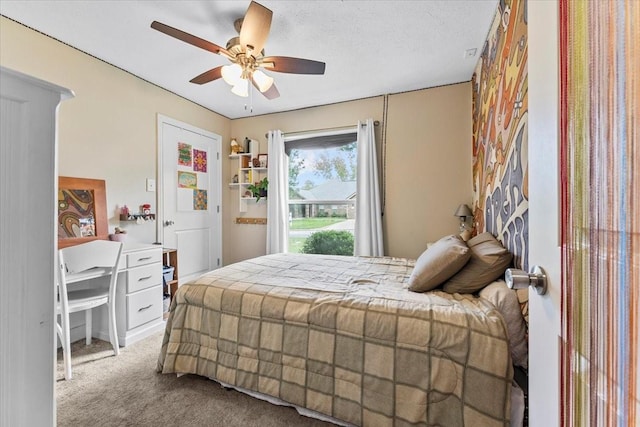 carpeted bedroom featuring a ceiling fan