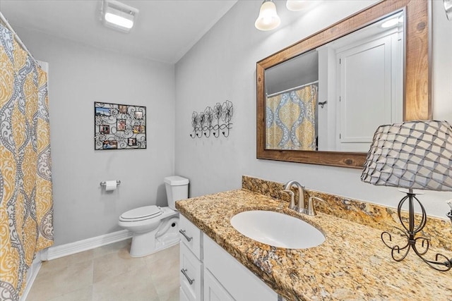 full bath with baseboards, tile patterned flooring, vanity, and toilet