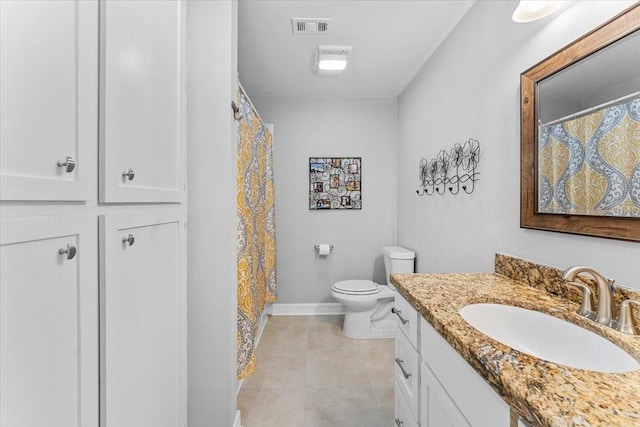 bathroom with visible vents, tile patterned flooring, vanity, toilet, and baseboards