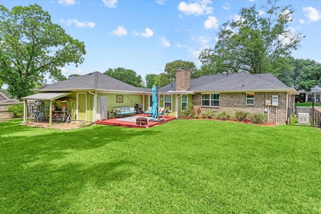 1441 Green Briar Dr, Huntsville, TX 77340 - rear view of property with a chimney and a deck