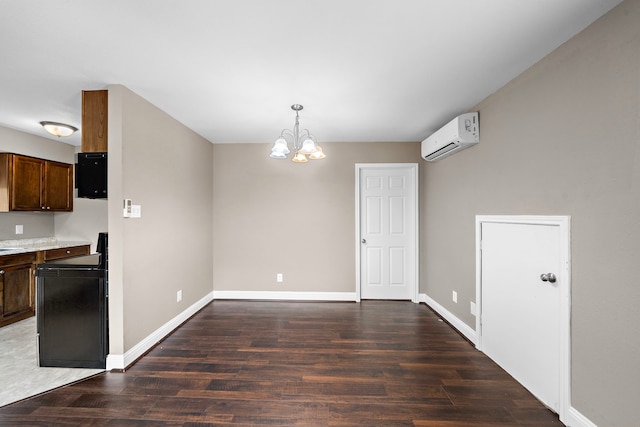 1111 Robert St, Pearland, TX 77581 - unfurnished dining area with a wall mounted air conditioner, a chandelier, wood finished floors, and baseboards