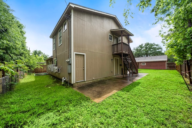 1111 Robert St, Pearland, TX 77581 - back of house featuring stairway, a patio area, and a deck