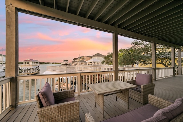 deck featuring a residential view, a water view, and outdoor lounge area