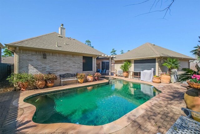 view of swimming pool featuring fence, a fenced in pool, and a patio