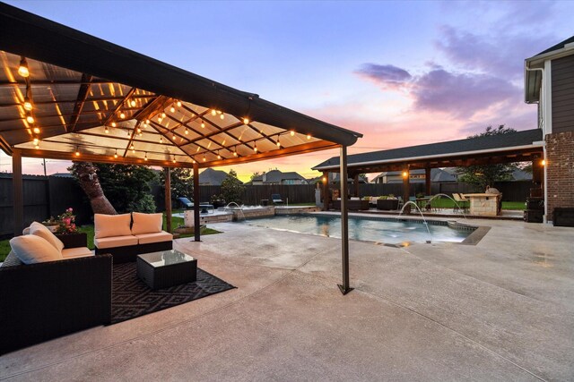 pool at dusk with a gazebo, a fenced backyard, outdoor lounge area, and a fenced in pool