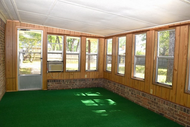unfurnished sunroom with cooling unit