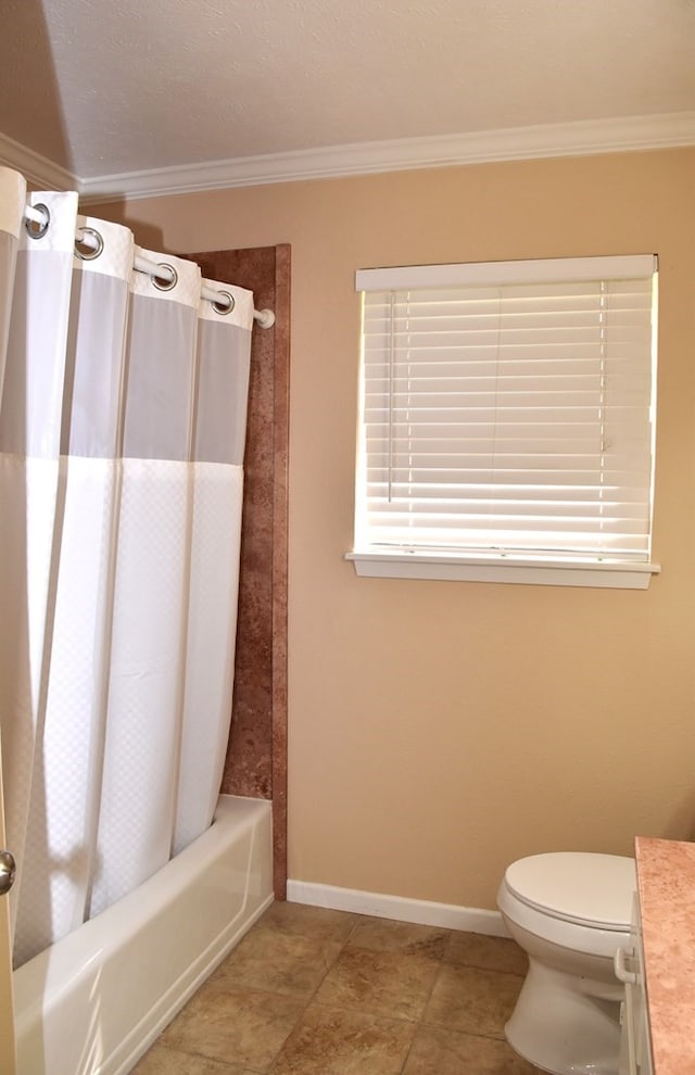 full bath featuring vanity, crown molding, shower / bath combo, and toilet