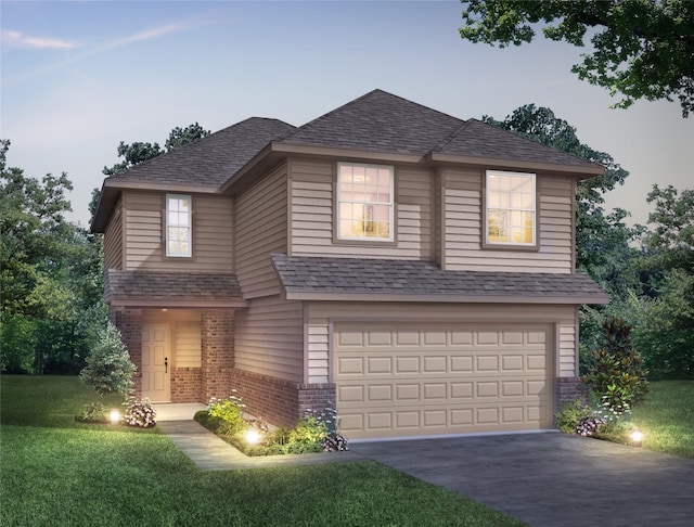 2103 Oakwood Terrace Dr, Houston, TX 77090 - view of front facade featuring brick siding, a front lawn, a garage, and driveway