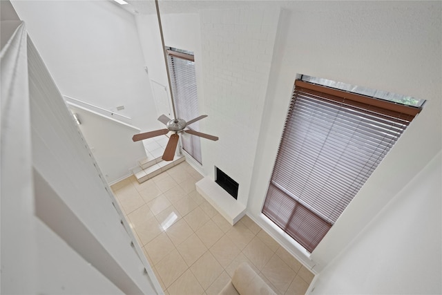 13742 Hollowgreen Dr Unit 604, Houston, TX 77082 - detailed view of a fireplace with raised hearth and ceiling fan