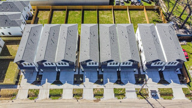 birds eye view of property with a residential view