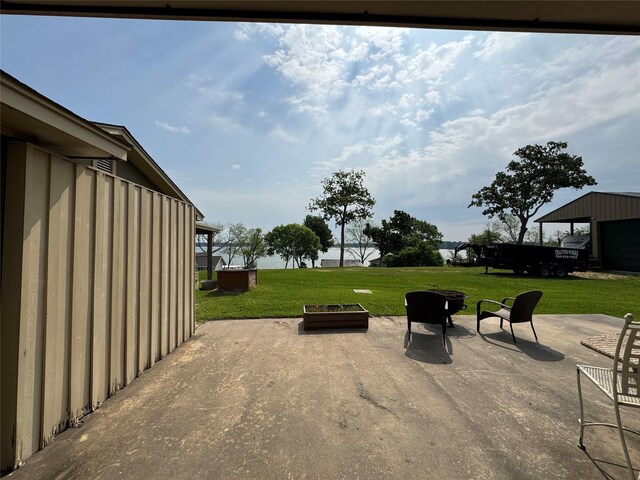 view of patio featuring a fire pit