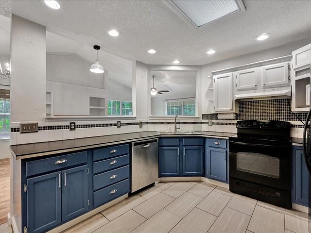 kitchen with a sink, stainless steel dishwasher, blue cabinets, and black range with electric cooktop