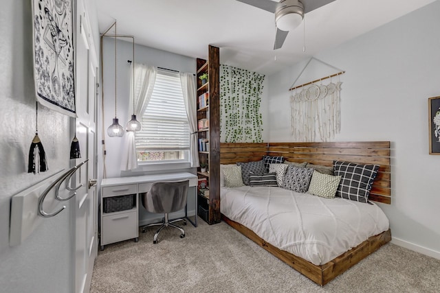 14302 Winema View Ln, Conroe, TX 77384 - carpeted bedroom featuring baseboards, a desk, and ceiling fan