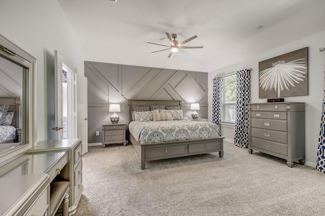 14302 Winema View Ln, Conroe, TX 77384 - bedroom featuring light carpet, baseboards, and a ceiling fan