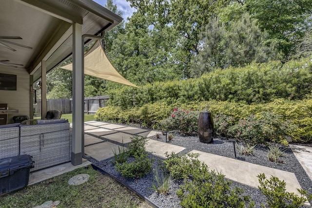 14302 Winema View Ln, Conroe, TX 77384 - view of patio / terrace with a ceiling fan and an outdoor living space
