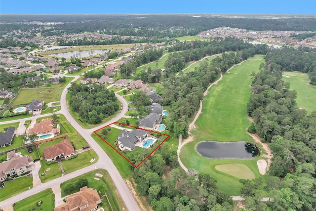 aerial view featuring a water view, a residential view, and golf course view