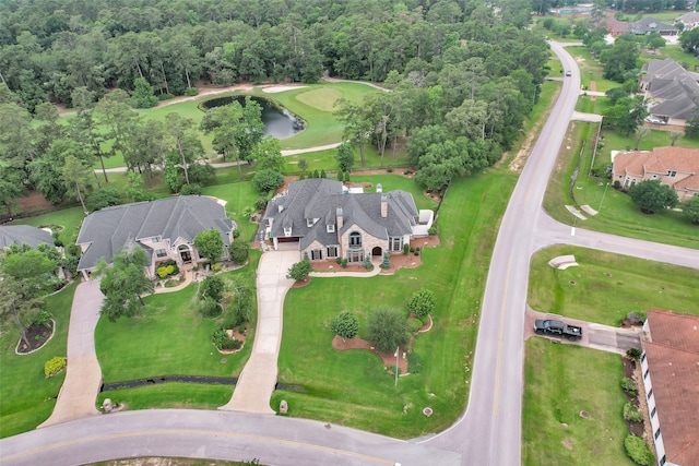 aerial view with a water view and a residential view