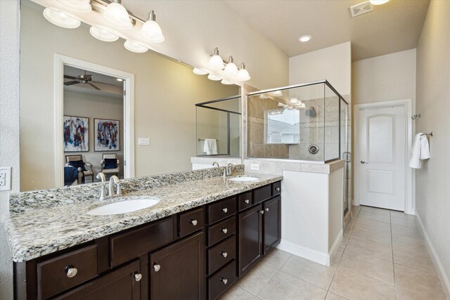 full bathroom featuring tile patterned flooring, a sink, and visible vents