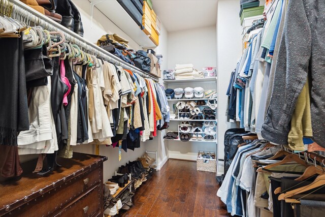 spacious closet featuring hardwood / wood-style floors