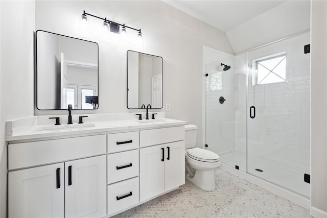 701 Coronado St, Houston, TX 77009 - full bathroom with a shower stall, double vanity, and toilet