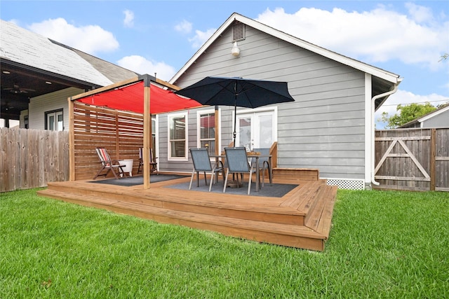 701 Coronado St, Houston, TX 77009 - back of house featuring a wooden deck, ceiling fan, and outdoor dining area