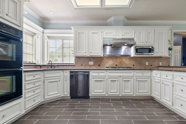 kitchen featuring appliances with stainless steel finishes, ornamental molding, under cabinet range hood, and white cabinetry