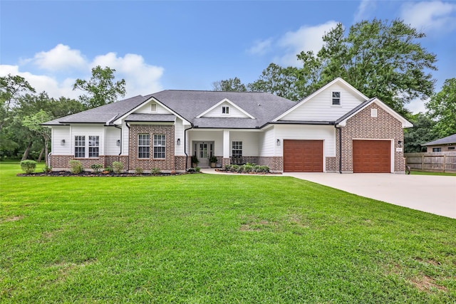 8118 S Laura Cir, Baytown, TX 77521 - craftsman house featuring fence, an attached garage, brick siding, and driveway