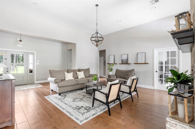 8118 S Laura Cir, Baytown, TX 77521 - living area with an inviting chandelier, baseboards, and wood finished floors