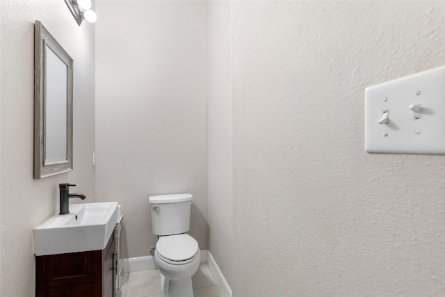 8118 S Laura Cir, Baytown, TX 77521 - bathroom with tile patterned flooring, toilet, and vanity