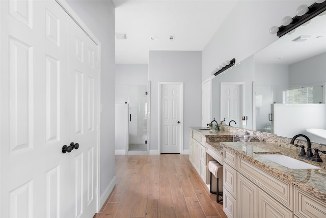 8118 S Laura Cir, Baytown, TX 77521 - full bath featuring a shower stall, baseboards, and a sink