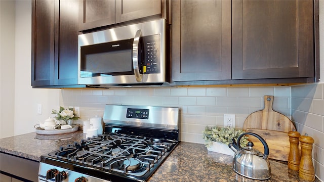 kitchen featuring tasteful backsplash, stainless steel appliances, and dark brown cabinets