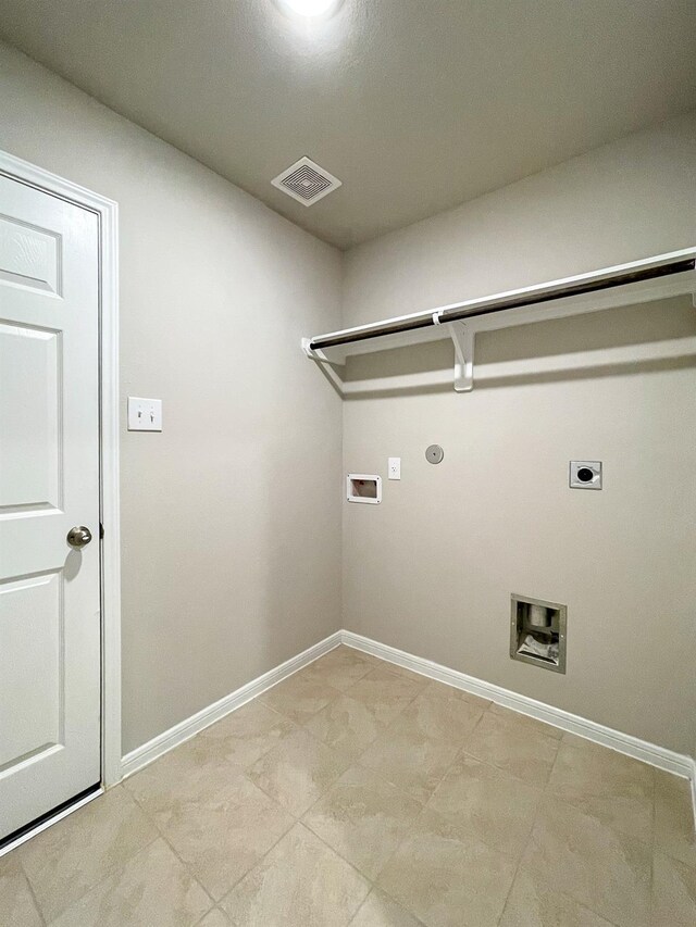 clothes washing area with washer hookup, laundry area, baseboards, electric dryer hookup, and visible vents