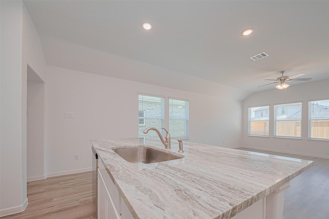 17722 Pamukkale Pl, Tomball, TX 77377 - kitchen featuring a sink, light wood-type flooring, white cabinets, a ceiling fan, and recessed lighting