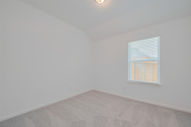 17722 Pamukkale Pl, Tomball, TX 77377 - spare room with carpet floors, lofted ceiling, and baseboards