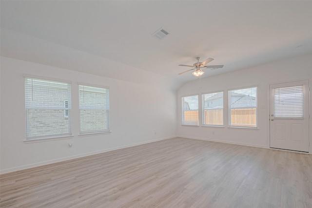 17722 Pamukkale Pl, Tomball, TX 77377 - spare room featuring light wood-type flooring, ceiling fan, and baseboards