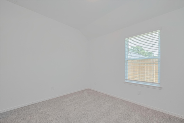 17722 Pamukkale Pl, Tomball, TX 77377 - unfurnished room with carpet, vaulted ceiling, and baseboards