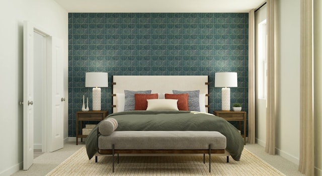 bedroom with carpet and baseboards