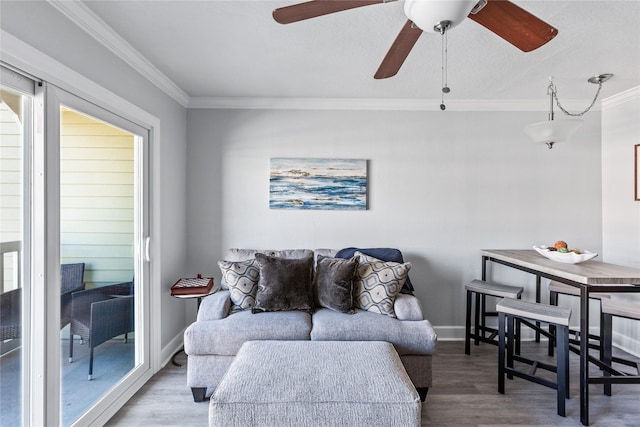 6300 Seawall Blvd Unit 3225, Galveston, TX 77551 - living area with a ceiling fan, ornamental molding, and wood finished floors
