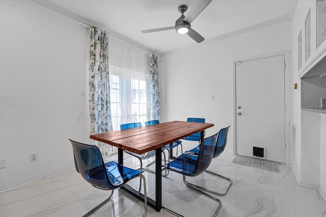 dining area with marble finish floor and ceiling fan