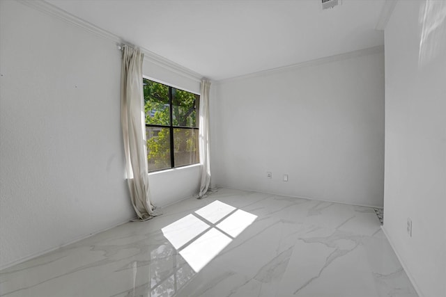 unfurnished room featuring crown molding and marble finish floor