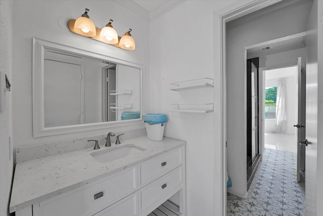 bathroom featuring visible vents, tile patterned floors, vanity, and crown molding