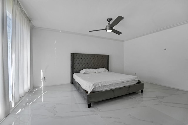 bedroom with marble finish floor and a ceiling fan