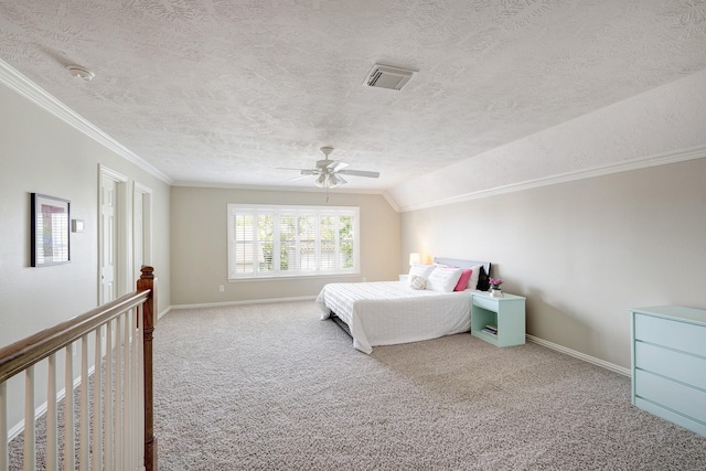 bedroom featuring baseboards, carpet floors, visible vents, and a textured ceiling