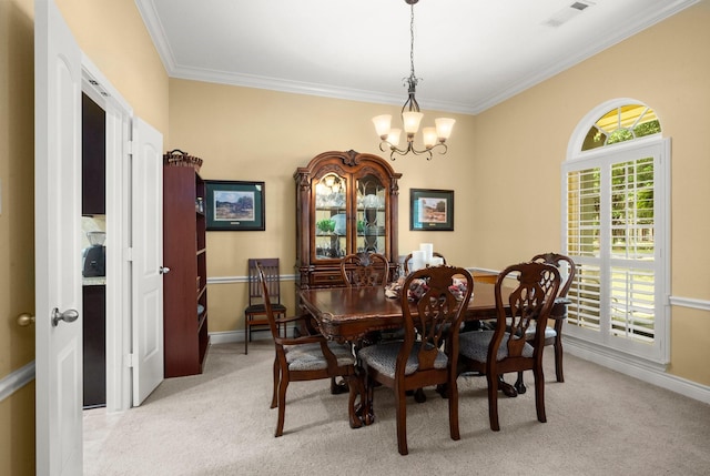 dining space featuring light carpet, crown molding, an inviting chandelier, and visible vents