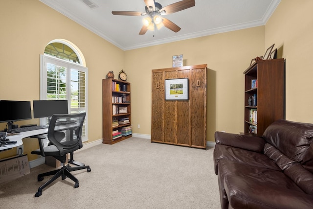 home office with baseboards, ornamental molding, ceiling fan, visible vents, and light carpet