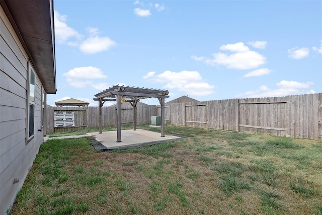 view of yard with a pergola, central air condition unit, a fenced backyard, and a patio