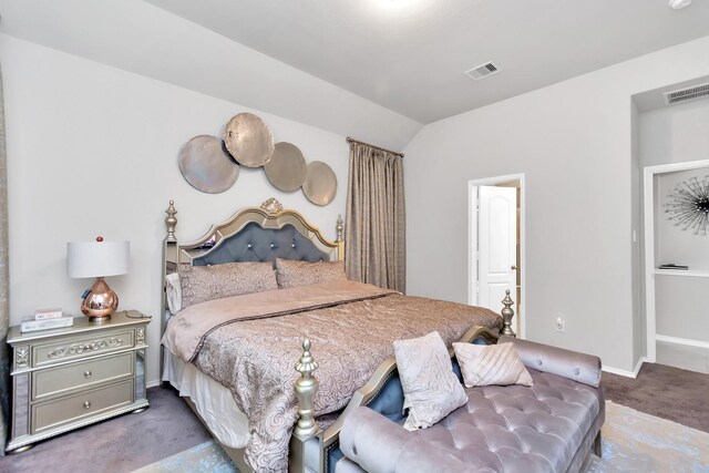 carpeted bedroom featuring vaulted ceiling, visible vents, and baseboards