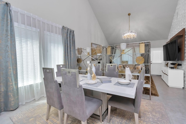 tiled dining space featuring high vaulted ceiling, a notable chandelier, and a healthy amount of sunlight
