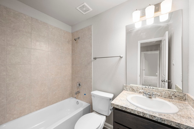 304 N Orange St, Sweeny, TX 77480 - bathroom with toilet, vanity, and shower / tub combination